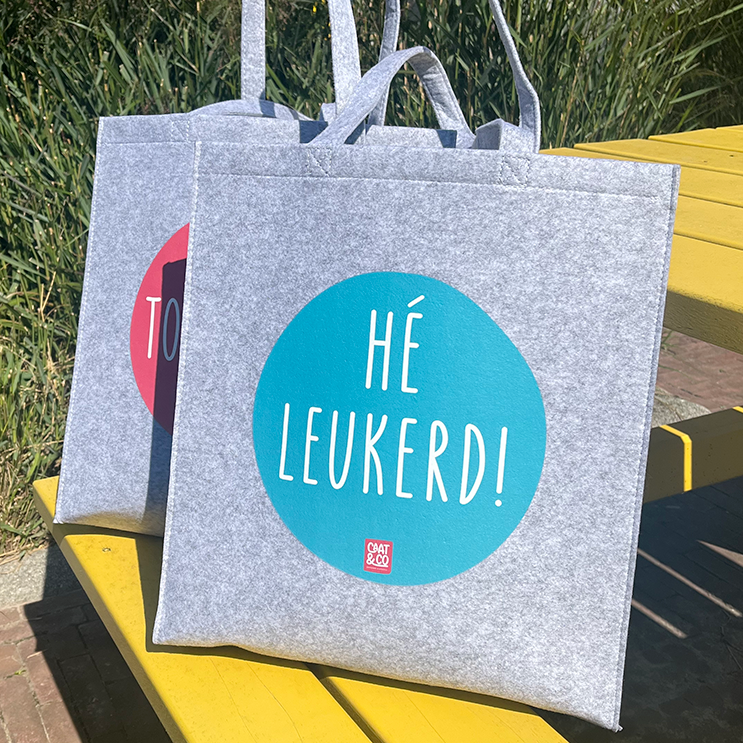 Tas hé leukerd in het zonnetje